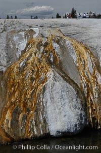 Cascade Geyser, a currently-dormant geyser with brightly color flow area into the Firehole River, Upper Geyser Basin, Yellowstone National Park, Wyoming