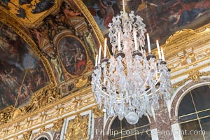 The Hall of Mirrors, or Galerie des Glaces, is the central gallery of the Palace of Versailles and is renowned as being one of the most famous rooms in the world, Chateau de Versailles, Paris, France