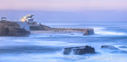 The Children's Pool, also known as Casa Cove, in pre-dawn light, La Jolla. Seal Rock in the foreground