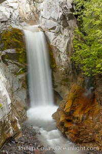 Christine Falls is a 69 foot (21m) waterfall in Mount Rainier.  The lower section of Christine Falls is  known for the bridge that spans across it.