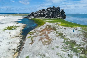 Clipperton Rock, a 95' high volcanic remnant, is the highest point on Clipperton Island, a spectacular coral atoll in the eastern Pacific. By permit HC / 1485 / CAB (France)
