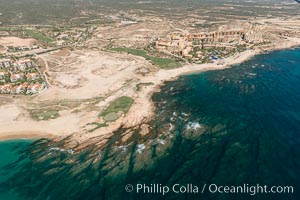 Underwater reef system along the coastline, sand beaches and residential and resort development along the coast near Cabo San Lucas, Mexico