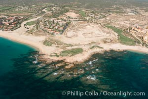 Underwater reef system along the coastline, sand beaches and residential and resort development along the coast near Cabo San Lucas, Mexico