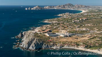 Punta Ballena, Faro Cabesa Ballena (foreground), Medano Beach and Land's End (distance). Residential and resort development along the coast near Cabo San Lucas, Mexico.