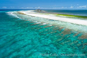 Coral Reef at Clipperton Island, aerial photo. Clipperton has healthy, beautiful coral reefs.  The white beaches are composed of white coralline rubble. Clipperton Island, a minor territory of France also known as Ile de la Passion, is a spectacular coral atoll in the eastern Pacific. By permit HC / 1485 / CAB (France)