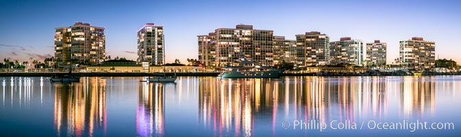 Coronado Shores condos reflected in Glorietta Bay, San Diego Bay, evening