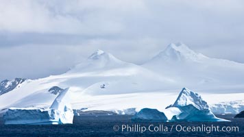 Coronation Island, is the largest of the South Orkney Islands, reaching 4,153' (1,266m) above sea level.  While it is largely covered by ice, Coronation Island also is home to some tundra habitat, and is inhabited by many seals, penguins and seabirds