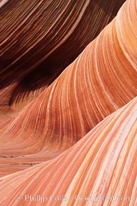 The Wave, an area of fantastic eroded sandstone featuring beautiful swirls, wild colors, countless striations, and bizarre shapes set amidst the dramatic surrounding North Coyote Buttes of Arizona and Utah.  The sandstone formations of the North Coyote Buttes, including the Wave, date from the Jurassic period. Managed by the Bureau of Land Management, the Wave is located in the Paria Canyon-Vermilion Cliffs Wilderness and is accessible on foot by permit only