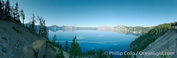 Panorama of Crater Lake, early morning. Crater Lake is the six-mile wide lake inside the collapsed caldera of volcanic Mount Mazama. Crater Lake is the deepest lake in the United States and the seventh-deepest in the world. Its maximum recorded depth is 1996 feet (608m). It lies at an altitude of 6178 feet (1880m), Crater Lake National Park