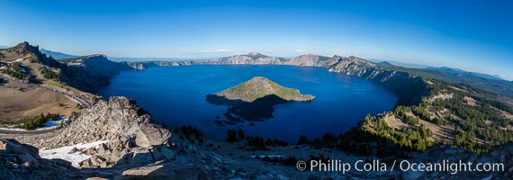 Panorama of Crater Lake from Watchman Lookout Station, panoramic picture. The Watchman Lookout Station No. 168 is one of two fire lookout towers in Crater Lake National Park in southern Oregon. For many years, National Park Service personnel used the lookout to watch for wildfires during the summer months. It is also a popular hiking destination because it offers an excellent view of Crater Lake and the surrounding area