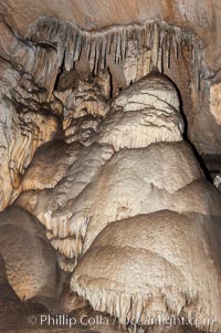 Many stalactites hang from the ceiling -- and a huge stalagmite has grown up from the floor -- of the Dome Room. The formation was named for its resemblence to the Capital Dome in Washington D.C, Crystal Cave, Sequoia Kings Canyon National Park, California