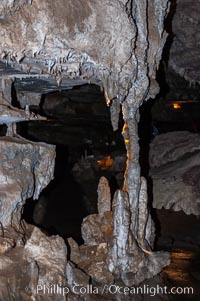 Calcite stalactites hanging from above have joined with stalagmites growing on the cave floor to form a solid column, Crystal Cave, Sequoia Kings Canyon National Park, California