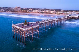 Crystal Pier with holiday decorations at sunset, Pacific Beach, California