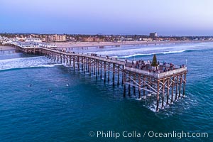 Crystal Pier with holiday decorations at sunset, Pacific Beach, California