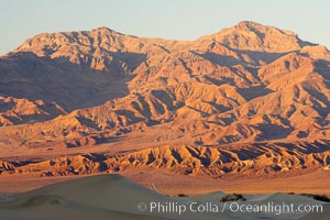 Grapevine Mountain Range, with sand dunes in the foreground.  Sunset, Stovepipe Wells, Death Valley National Park, California