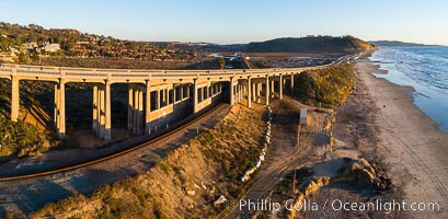 Del Mar Coastline and Bridge at sunset, aerial photo, Torrey Pines and La Jolla in the distance