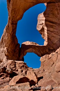 Double Arch, an amazing pair of natural arches formed in the red Entrada sandstone of Arches National Park