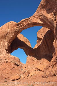 Double Arch, an amazing pair of natural arches formed in the red Entrada sandstone of Arches National Park. Utah, USA, natural history stock photograph, photo id 18182
