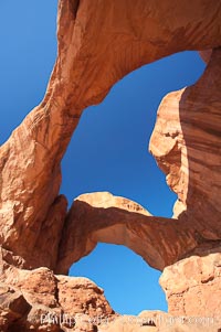 Double Arch, an amazing pair of natural arches formed in the red Entrada sandstone of Arches National Park