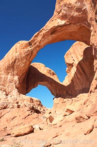 Double Arch, an amazing pair of natural arches formed in the red Entrada sandstone of Arches National Park