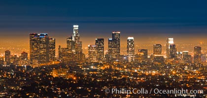 Downtown Los Angeles at night, street lights, buildings light up the night.