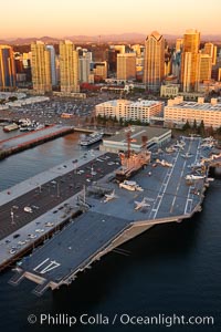 Downtown San Diego and USS Midway.  The USS Midway was a US Navy aircraft carrier, launched in 1945 and active through the Vietnam War and Operation Desert Storm, as of 2008 a museum along the downtown waterfront in San Diego