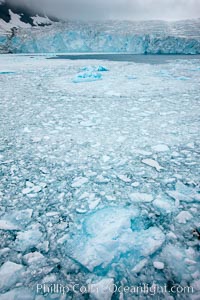 Drygalski Fjord, packed with brash ice which has broken away from Risting Glacier at the end of the narrow fjord.