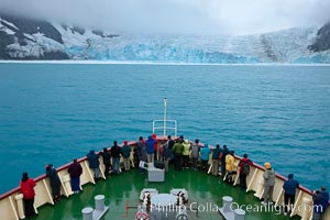 M/V Polar Star approaches Jenkins Glacier (left), Risting Glacier (center) and a third glacier (right) at the end of Drygalski Fjord