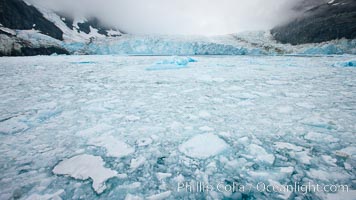 Drygalski Fjord, packed with brash ice which has broken away from Risting Glacier at the end of the narrow fjord.