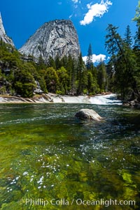 The Emerald Pool forms in the Merced River just above Vernal Falls.  Unfortunately, a few careless hikers have tried swimming in Emerald Pool only to be swept downstream and plunge over Vernals Falls to their deaths. Yosemite National Park, Spring