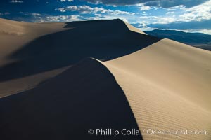 Eureka Dunes.  The Eureka Valley Sand Dunes are California's tallest sand dunes, and one of the tallest in the United States.  Rising 680' above the floor of the Eureka Valley, the Eureka sand dunes are home to several endangered species, as well as "singing sand" that makes strange sounds when it shifts.  Located in the remote northern portion of Death Valley National Park, the Eureka Dunes see very few visitors