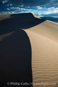 Eureka Dunes.  The Eureka Valley Sand Dunes are California's tallest sand dunes, and one of the tallest in the United States.  Rising 680' above the floor of the Eureka Valley, the Eureka sand dunes are home to several endangered species, as well as "singing sand" that makes strange sounds when it shifts.  Located in the remote northern portion of Death Valley National Park, the Eureka Dunes see very few visitors