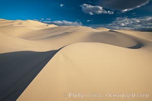 Eureka Dunes.  The Eureka Valley Sand Dunes are California's tallest sand dunes, and one of the tallest in the United States.  Rising 680' above the floor of the Eureka Valley, the Eureka sand dunes are home to several endangered species, as well as "singing sand" that makes strange sounds when it shifts.  Located in the remote northern portion of Death Valley National Park, the Eureka Dunes see very few visitors