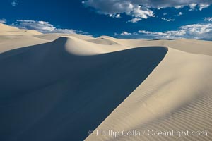 Eureka Dunes.  The Eureka Valley Sand Dunes are California's tallest sand dunes, and one of the tallest in the United States.  Rising 680' above the floor of the Eureka Valley, the Eureka sand dunes are home to several endangered species, as well as "singing sand" that makes strange sounds when it shifts.  Located in the remote northern portion of Death Valley National Park, the Eureka Dunes see very few visitors