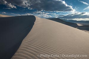 Eureka Dunes.  The Eureka Valley Sand Dunes are California's tallest sand dunes, and one of the tallest in the United States.  Rising 680' above the floor of the Eureka Valley, the Eureka sand dunes are home to several endangered species, as well as "singing sand" that makes strange sounds when it shifts.  Located in the remote northern portion of Death Valley National Park, the Eureka Dunes see very few visitors