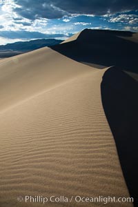 Eureka Dunes.  The Eureka Valley Sand Dunes are California's tallest sand dunes, and one of the tallest in the United States.  Rising 680' above the floor of the Eureka Valley, the Eureka sand dunes are home to several endangered species, as well as "singing sand" that makes strange sounds when it shifts.  Located in the remote northern portion of Death Valley National Park, the Eureka Dunes see very few visitors