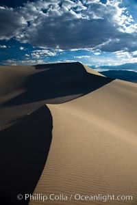 Eureka Dunes.  The Eureka Valley Sand Dunes are California's tallest sand dunes, and one of the tallest in the United States.  Rising 680' above the floor of the Eureka Valley, the Eureka sand dunes are home to several endangered species, as well as "singing sand" that makes strange sounds when it shifts.  Located in the remote northern portion of Death Valley National Park, the Eureka Dunes see very few visitors