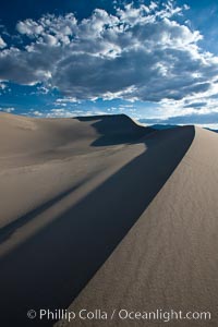 Eureka Dunes.  The Eureka Valley Sand Dunes are California's tallest sand dunes, and one of the tallest in the United States.  Rising 680' above the floor of the Eureka Valley, the Eureka sand dunes are home to several endangered species, as well as "singing sand" that makes strange sounds when it shifts.  Located in the remote northern portion of Death Valley National Park, the Eureka Dunes see very few visitors