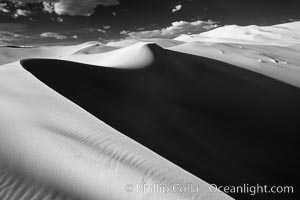 Eureka Sand Dunes, infrared black and white.  The Eureka Dunes are California's tallest sand dunes, and one of the tallest in the United States.  Rising 680' above the floor of the Eureka Valley, the Eureka sand dunes are home to several endangered species, as well as "singing sand" that makes strange sounds when it shifts, Death Valley National Park