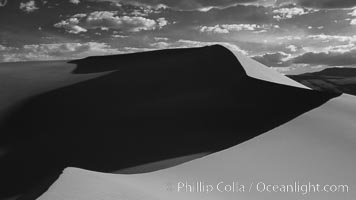 Eureka Sand Dunes, infrared black and white.  The Eureka Dunes are California's tallest sand dunes, and one of the tallest in the United States.  Rising 680' above the floor of the Eureka Valley, the Eureka sand dunes are home to several endangered species, as well as "singing sand" that makes strange sounds when it shifts, Death Valley National Park