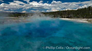 Excelsior Geyser, now dormant, was formerly the worlds largest geyser. It still produces immense runoff into the Firehole River: 4,500 gallons per minute, or 6 million gallons per day. It is located in Midway Geyser Basin, Yellowstone National Park, Wyoming