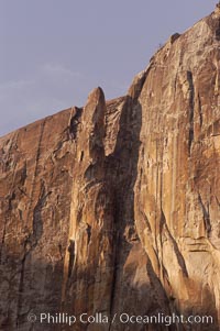 The Finger, a dramatic spire alongside Yosemite Falls that is a popular destination for advanced climbers.  Note the rope suspended between the spire and cliffs.  Yosemite Valley, Yosemite National Park, California