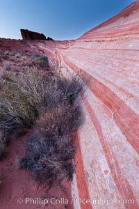 The Fire Wave, a beautiful sandstone formation exhibiting dramatic striations, striped layers in the geologic historical record.