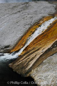 Excelsior Geyser, though dormant, still produces immense runoff into the Firehole River: 4,500 gallons per minute, or 6 million gallons per day.  It is located in Midway Geyser Basin, Yellowstone National Park, Wyoming