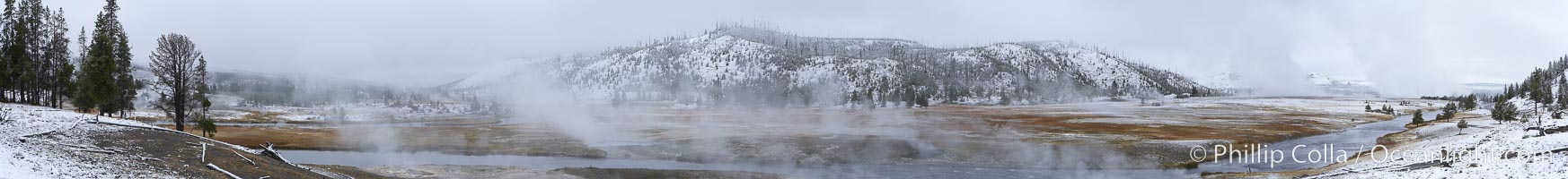 Firehole River, natural hot spring water steaming in cold winter air, panorama, Midway Geyser Basin, Yellowstone National Park, Wyoming