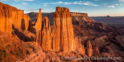 Fisher Towers at sunset, near Moab, Utah. Fisher Towers are a series of towers made of Cutler sandstone capped with Moenkopi sandstone and caked with a stucco of red mud located near Moab, Utah