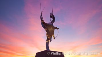 Flama de la Amistad, a statue by Leonardo Nierman.  Installed in the San Diego Convention Centers outdoor amphitheater, Flame of Friendship is a polished, stainless-steel statue set against San Diego Bay weighing 3,700 pounds and standing 20 feet tall and eight feet wide