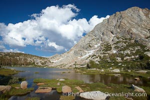 Fletcher Peak (11407') rises above Fletcher Lake (10174'), near Vogelsang High Sierra Camp in Yosemite's high country, Yosemite National Park, California