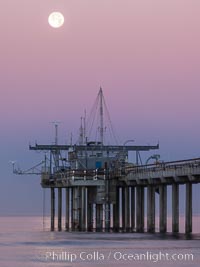 Full Moon Setting Over SIO Pier in the moments just before sunrise, Scripps Institution of Oceanography, La Jolla, California