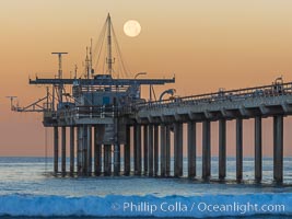 Full Moon Setting Over SIO Pier in the moments just before sunrise, Scripps Institution of Oceanography, La Jolla, California